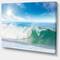 Designart - White and Blue Waves under Sun - Seascape Canvas Art Print